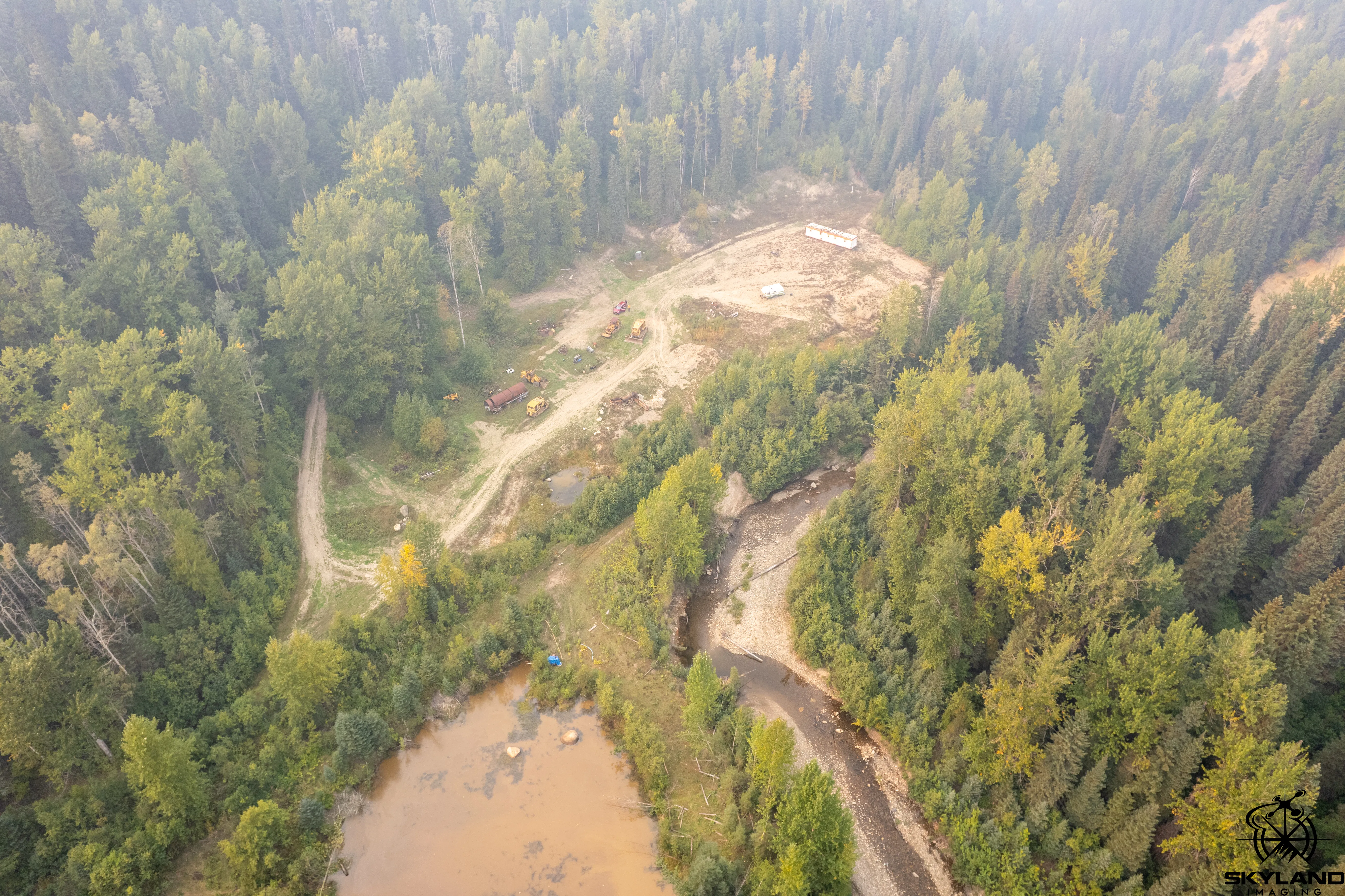 Placer claim topographic mapping, smoke-season flight — hero