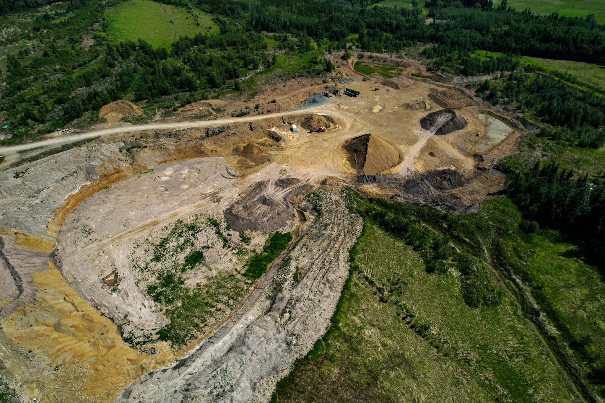 Topo update for an active aggregate pit — hero